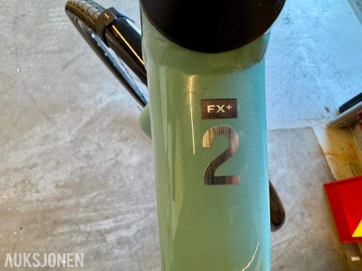 Trek FX+ elsykkel med lader