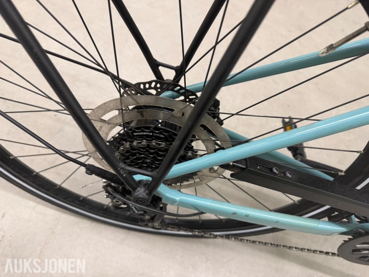 Trek FX+ elsykkel med lader