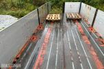 Istrail 3-akslet semitrailer, åpent plan, containerfester