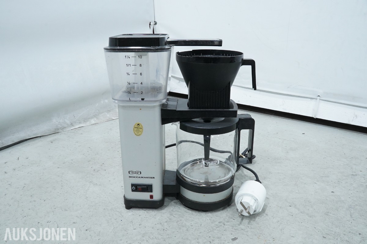 Parti med kaffemaskiner, kjøkkenmaskin, blender og råsaftsentrifuge