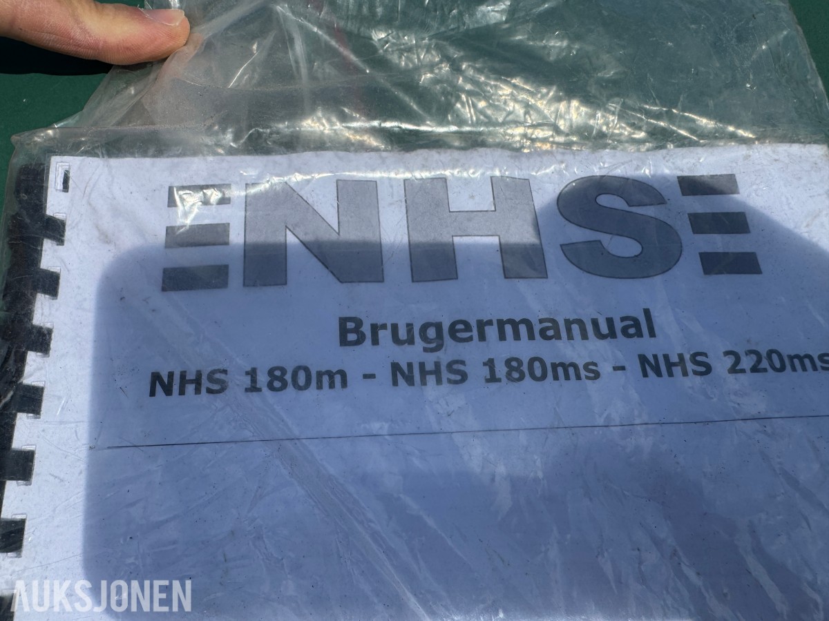 2015 NHS 180M flishugger, hengerunderstell, starter og går