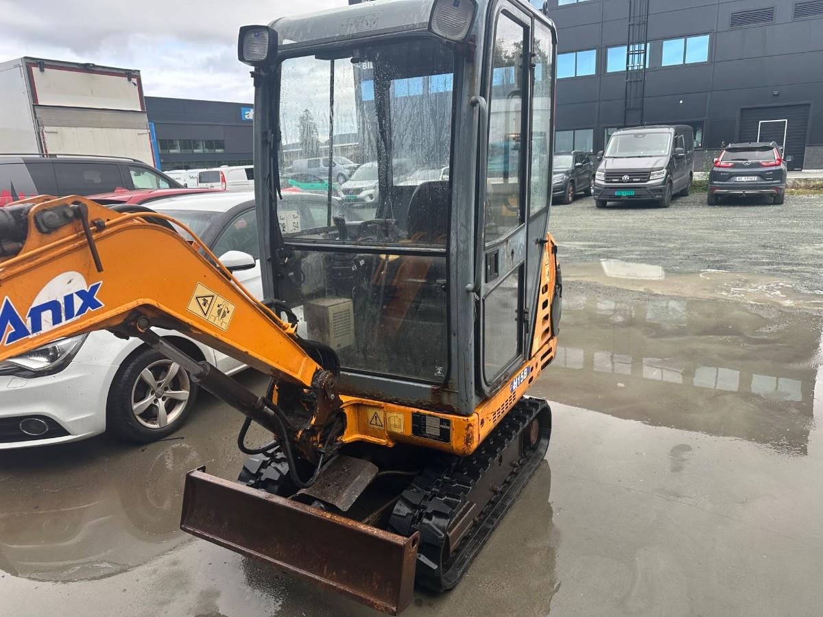 1997 Hanix H15B Minigraver, skjær og skuffe