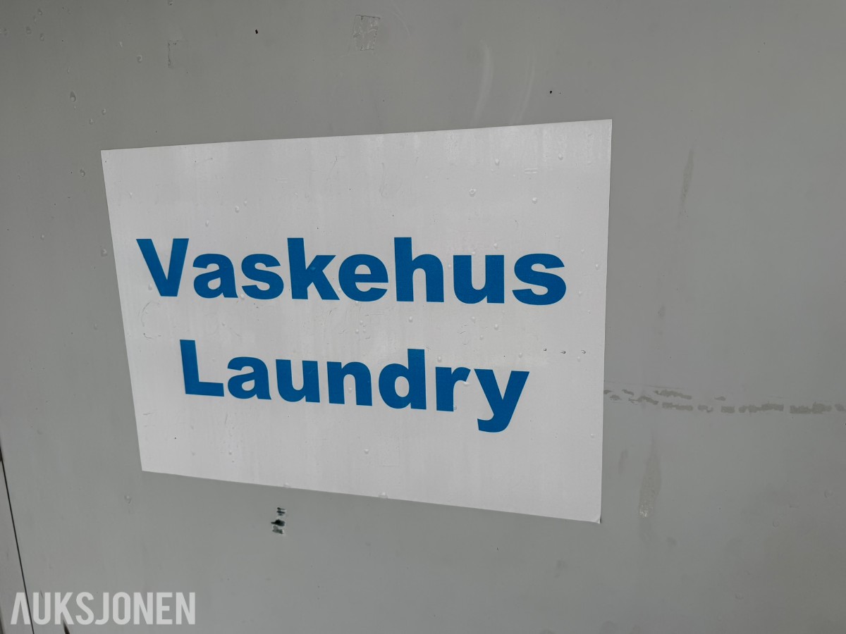 Container vaskerom med vaskemaskiner og tørketromler