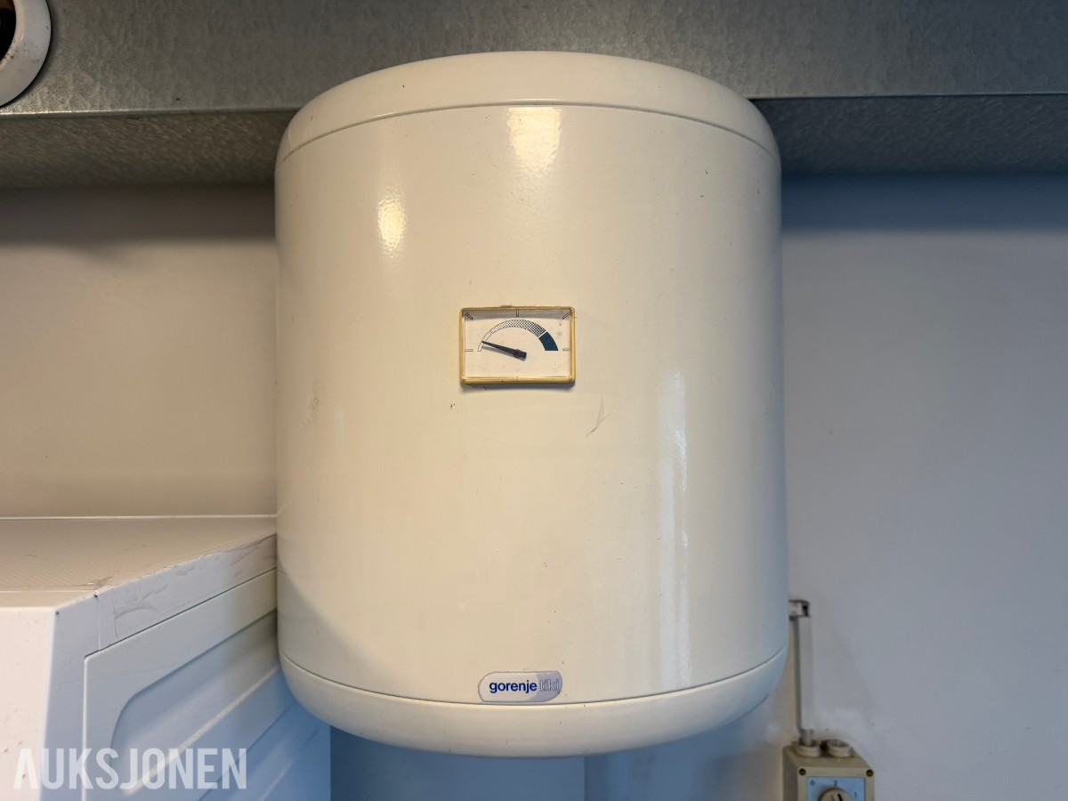 Container vaskerom med vaskemaskiner og tørketromler