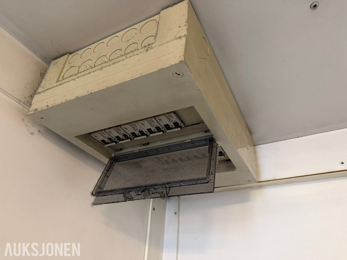 Container vaskerom med vaskemaskiner og tørketromler
