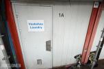Container vaskerom med vaskemaskiner og tørketromler