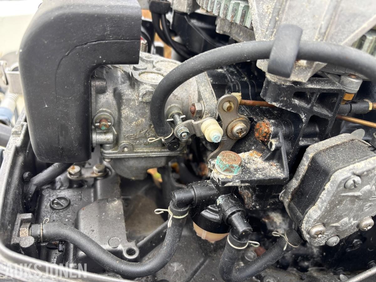 1980 Rana 17 med 30hk Tohatsu motor og båthenger