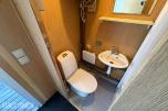 3 containerbrakker med 2 hybler og separate soverom