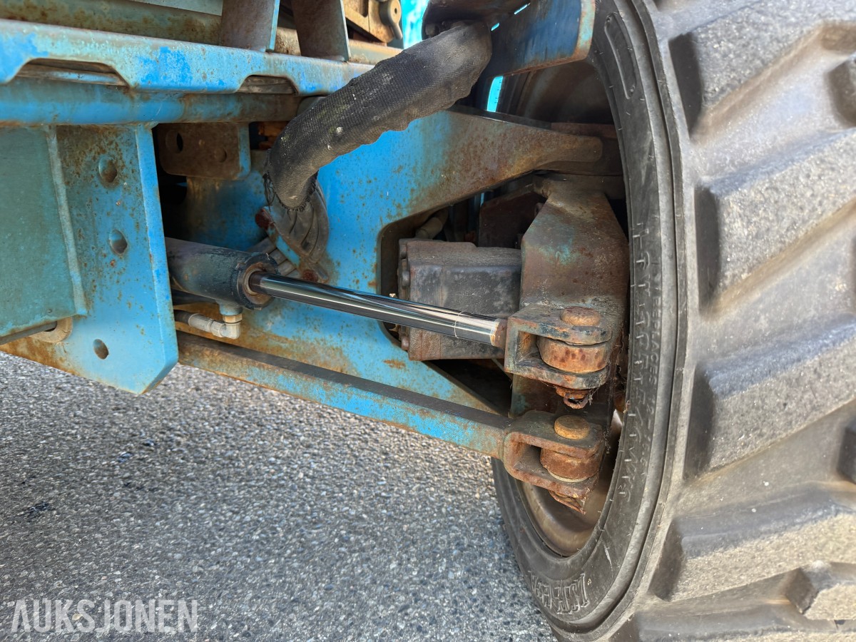 2003 Genie GS-5390 RT 4X4 SAKSELIFT MED STØTTEBEIN