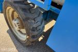 2003 Genie GS-5390 RT 4X4 SAKSELIFT MED STØTTEBEIN