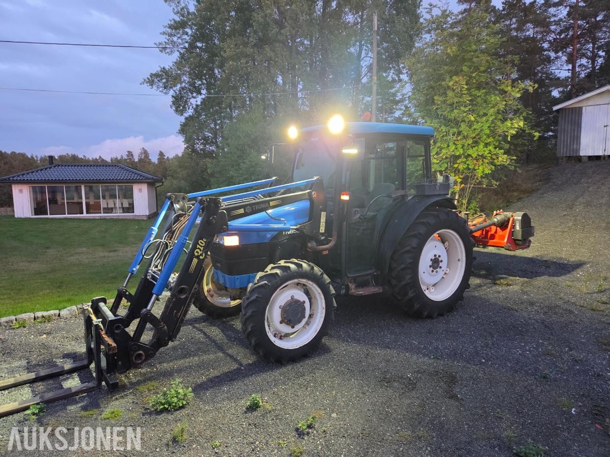 2000 New Holland TN65D med Trima 310C frontlaster