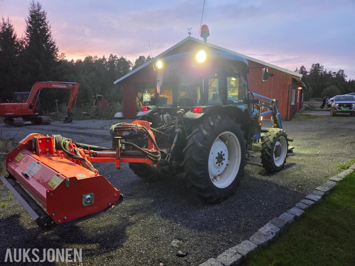 2000 New Holland TN65D med Trima 310C frontlaster
