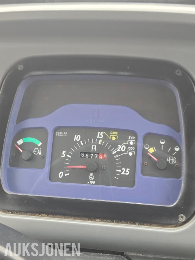 2000 New Holland TN65D med Trima 310C frontlaster