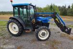 2000 New Holland TN65D med Trima 310C frontlaster