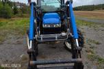 2000 New Holland TN65D med Trima 310C frontlaster