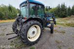 2000 New Holland TN65D med Trima 310C frontlaster