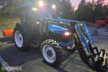 2000 New Holland TN65D med Trima 310C frontlaster