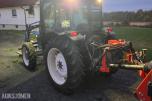 2000 New Holland TN65D med Trima 310C frontlaster