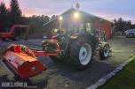 2000 New Holland TN65D med Trima 310C frontlaster