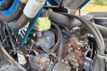 2000 New Holland TN65D med Trima 310C frontlaster