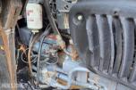 2000 New Holland TN65D med Trima 310C frontlaster