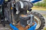 2000 New Holland TN65D med Trima 310C frontlaster