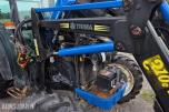 2000 New Holland TN65D med Trima 310C frontlaster