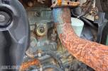 2000 New Holland TN65D med Trima 310C frontlaster