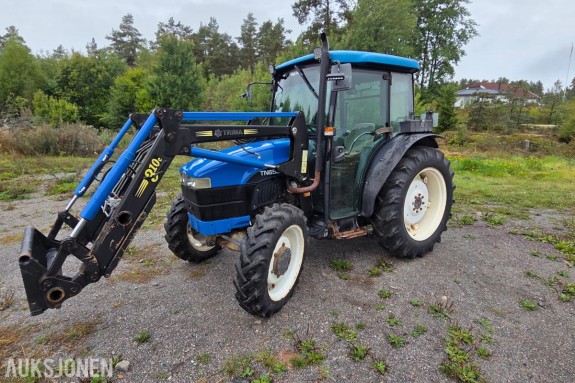 2000 New Holland TN65D med Trima 310C frontlaster
