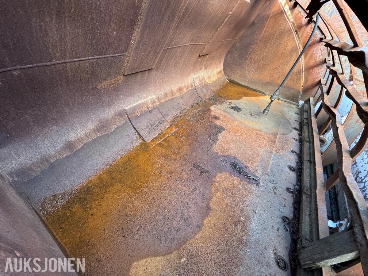 Hjullasterskuffe med hydraulisk klype