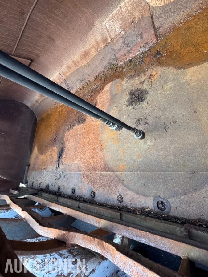 Hjullasterskuffe med hydraulisk klype