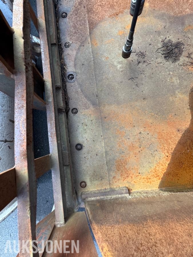 Hjullasterskuffe med hydraulisk klype