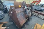 Hjullasterskuffe med hydraulisk klype