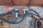 Hjullasterskuffe med hydraulisk klype
