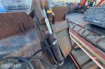 Hjullasterskuffe med hydraulisk klype