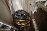 20-fots container med diverse innhold - stillas, stiger, kabler ol