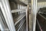 20-fots container med diverse innhold - stillas, stiger, kabler ol