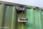 1995 8 fots Lagercontainer i stål med belysning og reol