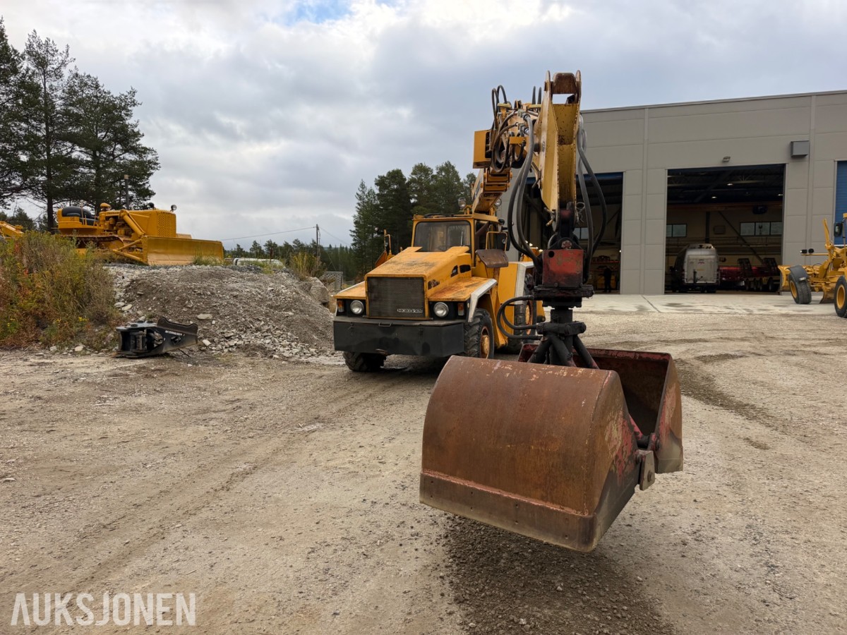 1990 mod. Moelven Munsters HLD 2200 kran m/roterende gripeskuffe