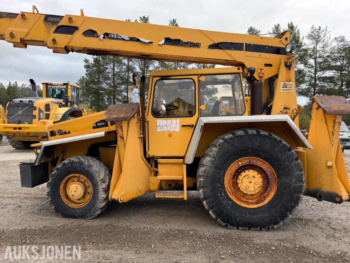 1990 mod. Moelven Munsters HLD 2200 kran m/roterende gripeskuffe