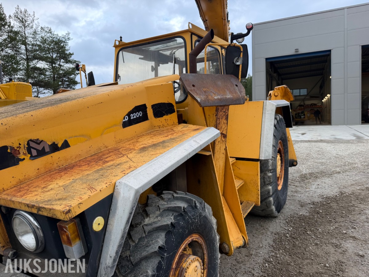 1990 mod. Moelven Munsters HLD 2200 kran m/roterende gripeskuffe