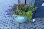 Blomsterkasser og serveringsskilt