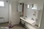 Sanitærcontainer med WC, dusj og garderobe