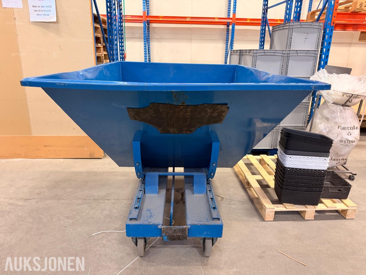 Tippcontainer for papp med mekanisk tippmekanisme